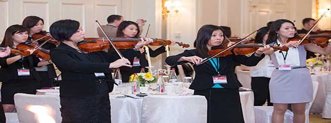 crescendo team building musical activity people pay violins