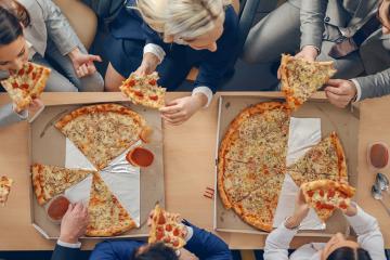 people eating pizza
