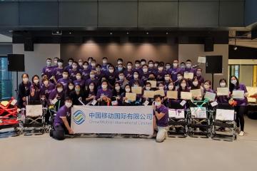 Group of teams with completed wheelchairs
