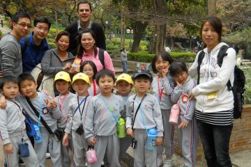 employees with group of children CSR activity