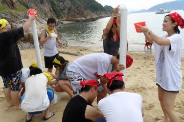 people bonding on the beach relaxing outdoor team building activity beach
