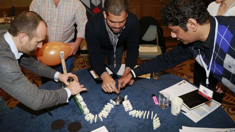 the domino effect creative team building activity