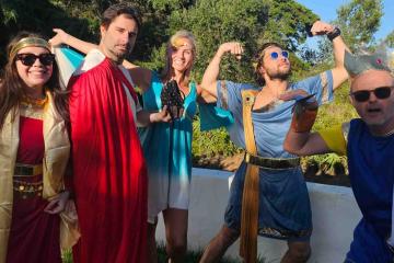 dressed as Olympian gods